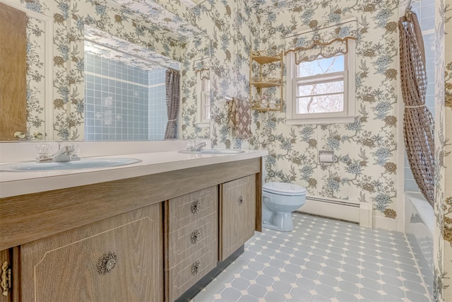 full bathroom featuring shower / tub combo with curtain, baseboard heating, vanity, tile patterned floors, and toilet