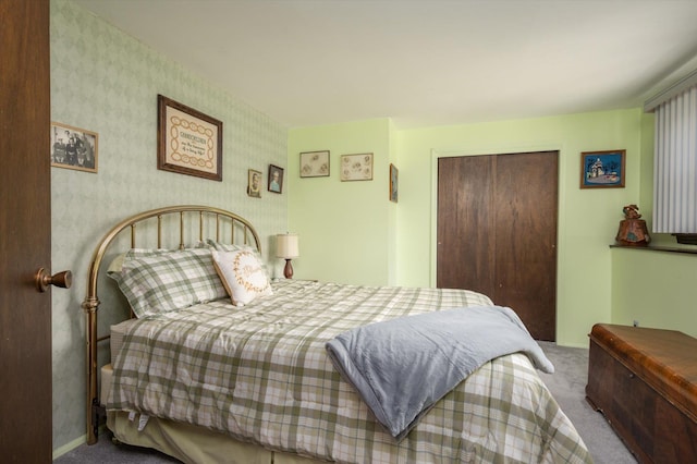 bedroom featuring carpet floors and a closet