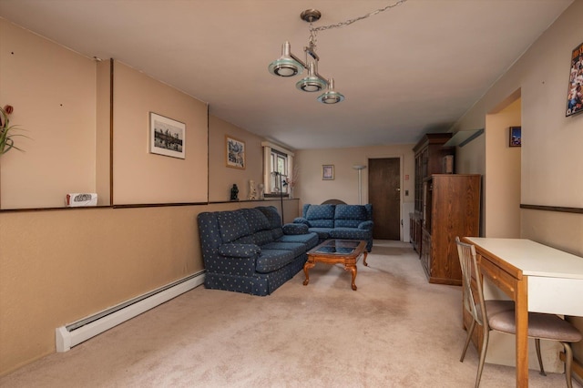 carpeted living room featuring baseboard heating