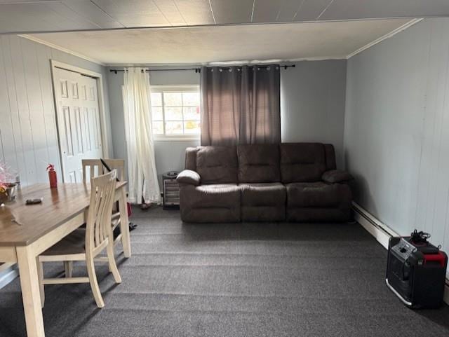 living room featuring crown molding, wood walls, and dark colored carpet