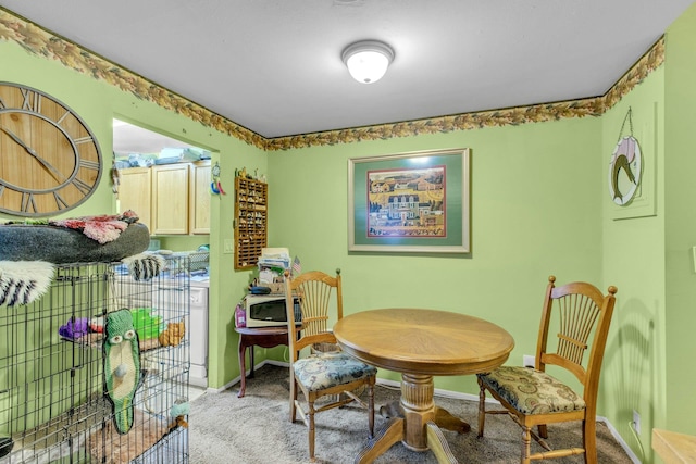 view of carpeted dining room