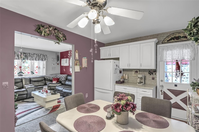 dining area featuring ceiling fan