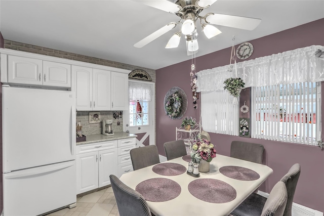 dining area with ceiling fan