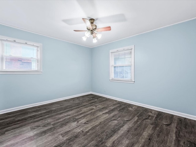 unfurnished room featuring ceiling fan and dark hardwood / wood-style flooring