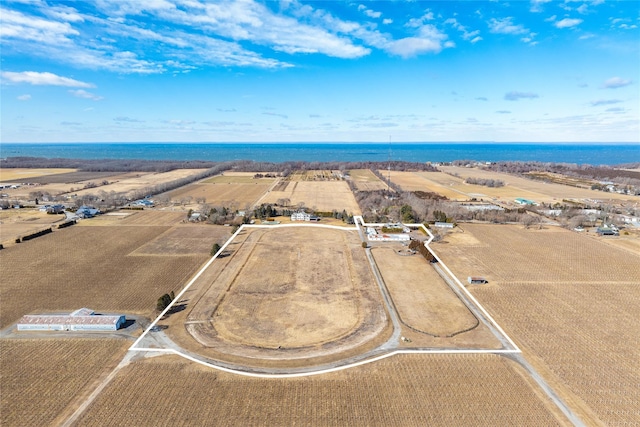 bird's eye view with a rural view and a water view