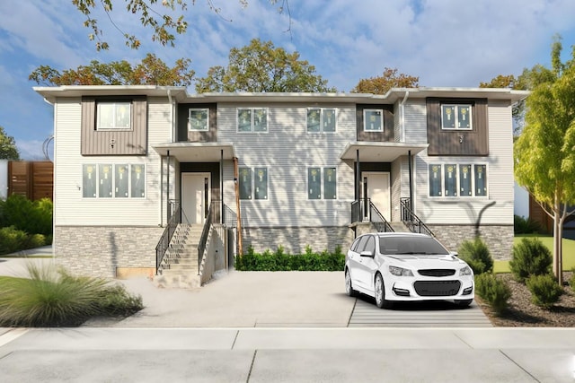 view of property featuring driveway