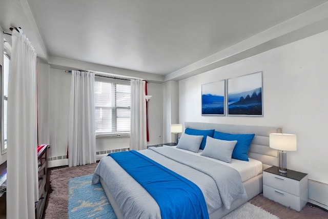 carpeted bedroom featuring radiator heating unit