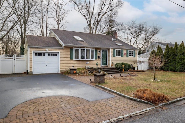 single story home with a garage and a front yard