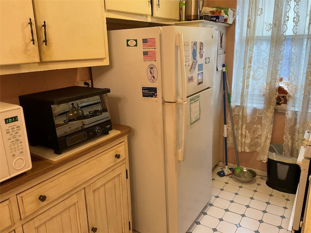 kitchen featuring white appliances