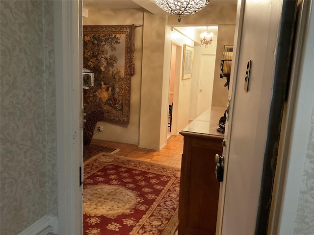 bathroom with vanity, parquet flooring, and a chandelier