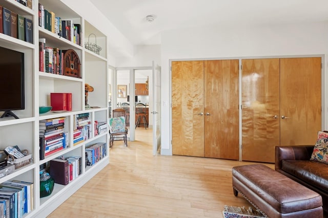 sitting room featuring light hardwood / wood-style flooring