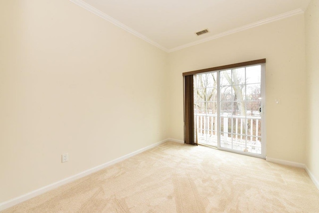 unfurnished room featuring light colored carpet and ornamental molding