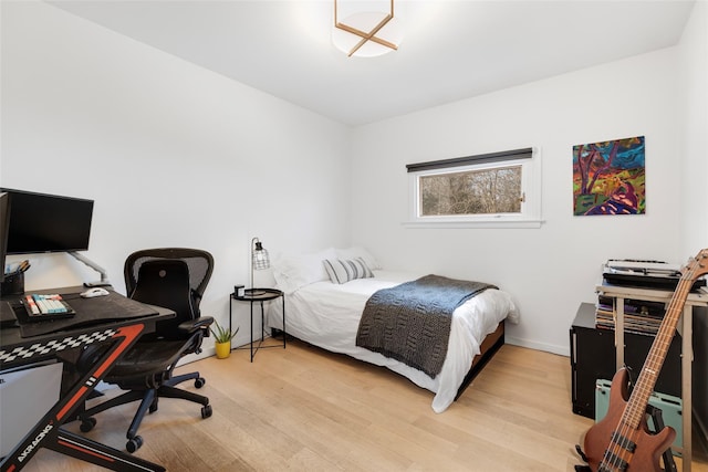 bedroom featuring light wood-type flooring