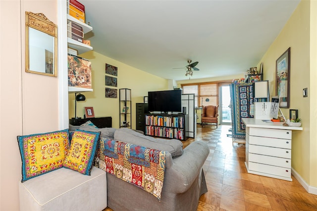 living room featuring ceiling fan