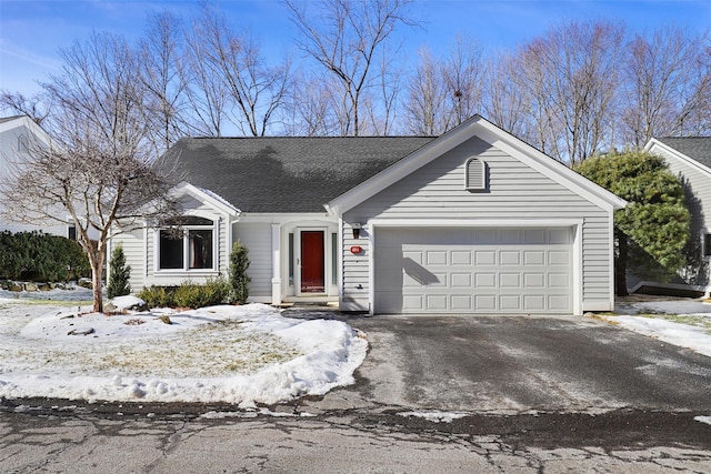 single story home featuring a garage