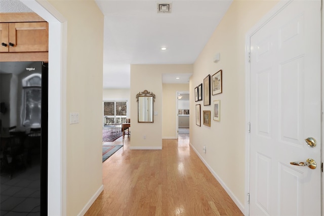 hall featuring light hardwood / wood-style floors