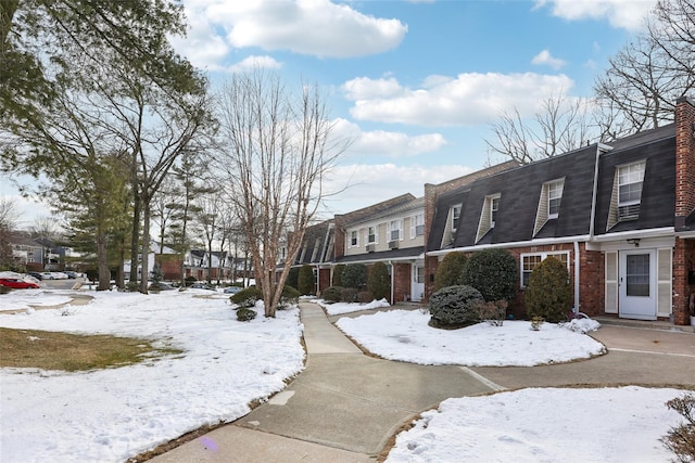 view of snow covered property