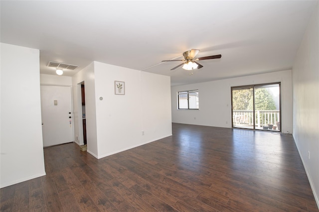 empty room featuring dark hardwood / wood-style floors and ceiling fan