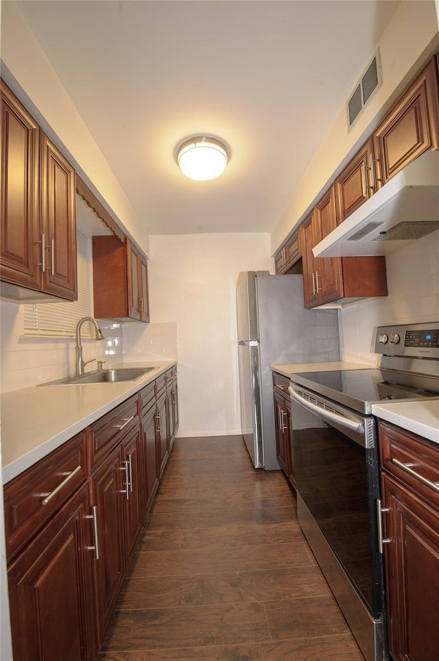 kitchen with sink, backsplash, dark hardwood / wood-style flooring, and electric stove