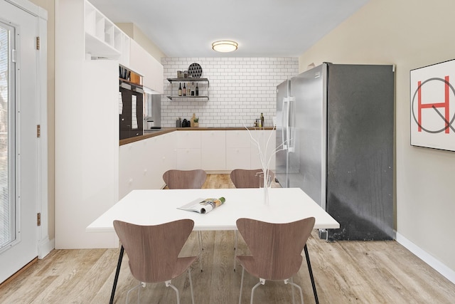 dining room featuring light wood-type flooring