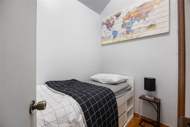 bedroom featuring vaulted ceiling