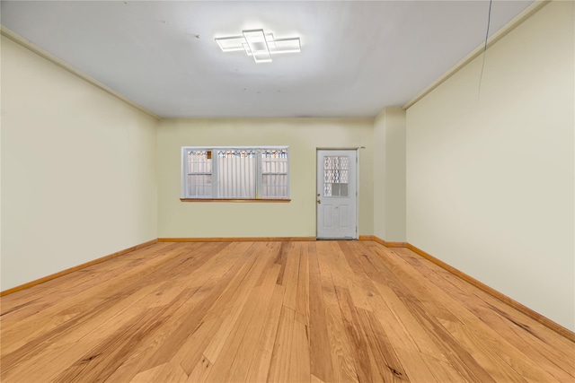 empty room featuring hardwood / wood-style flooring