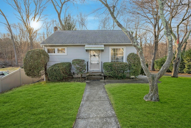 view of front of house with a front lawn