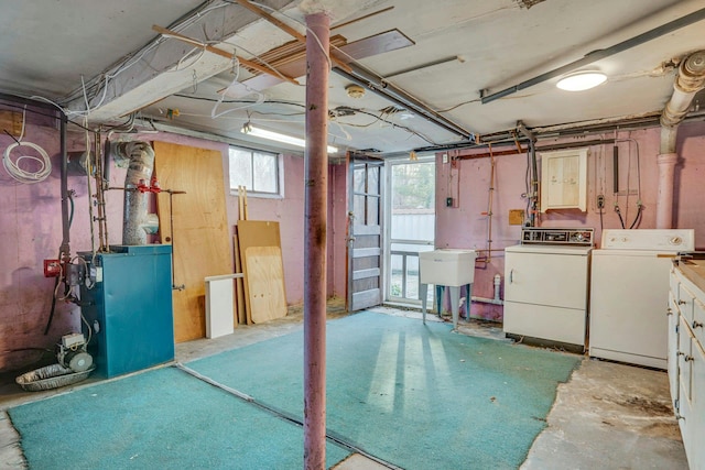 basement with washing machine and dryer