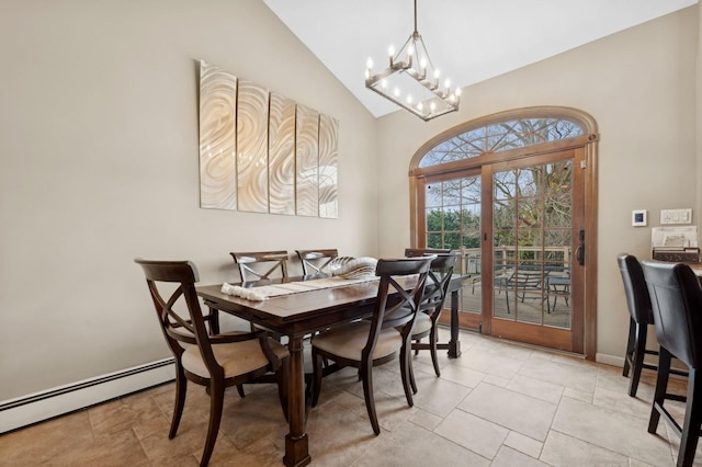 dining space with lofted ceiling, a baseboard heating unit, a notable chandelier, and french doors