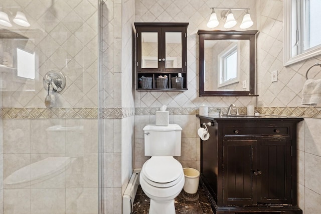 bathroom featuring walk in shower, toilet, tile walls, vanity, and a baseboard heating unit