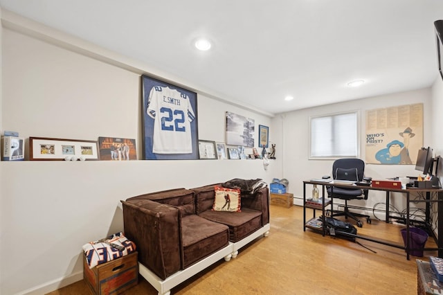 office with light hardwood / wood-style flooring