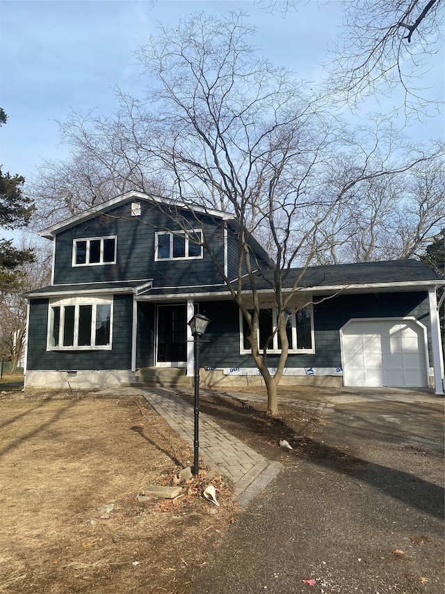 view of front of home with a garage