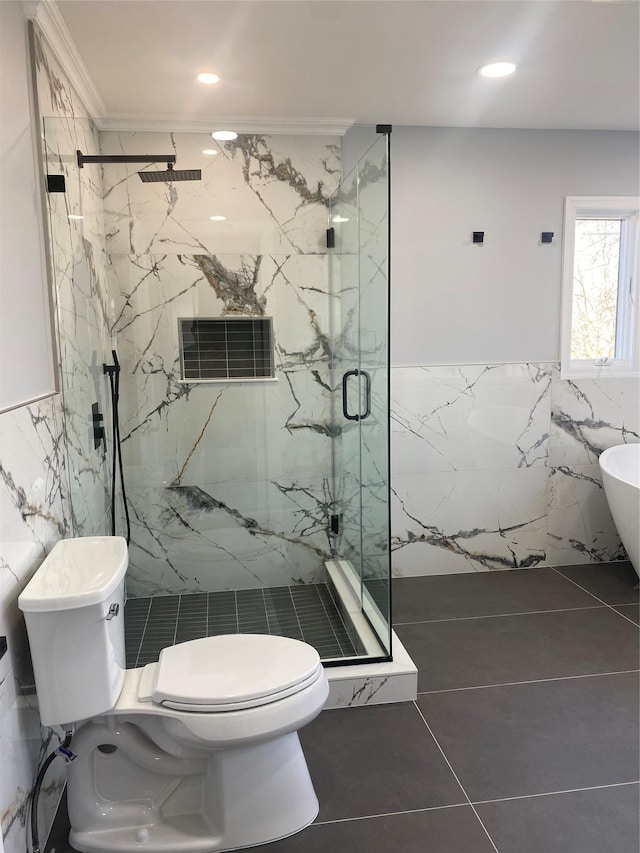 bathroom featuring crown molding, tile walls, an enclosed shower, tile patterned floors, and toilet