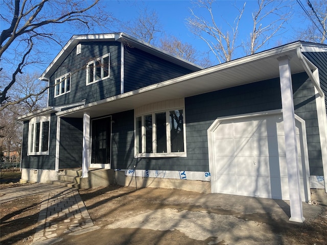 view of front of home with a garage