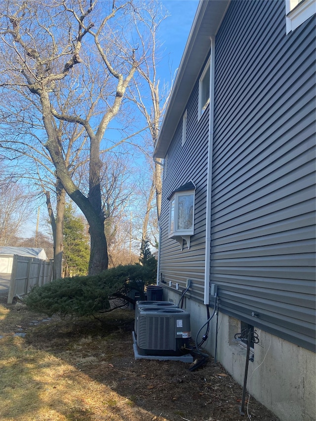 view of yard featuring central air condition unit