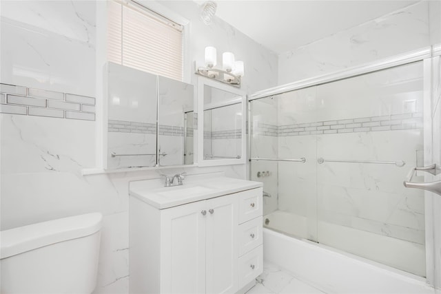 full bathroom featuring toilet, vanity, shower / bath combination with glass door, and a chandelier