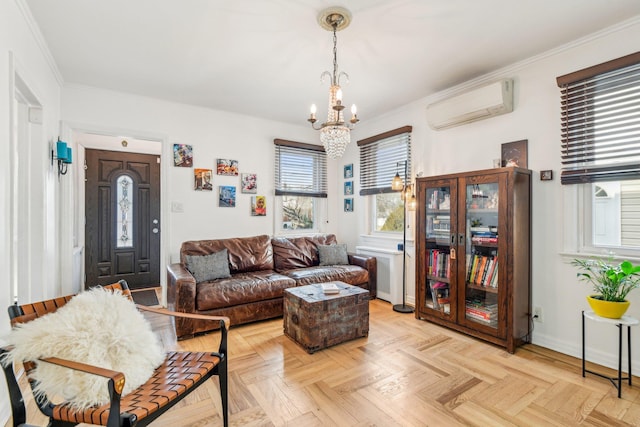 living room with light parquet flooring, an AC wall unit, ornamental molding, and a notable chandelier