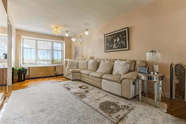 living room with wood-type flooring and radiator