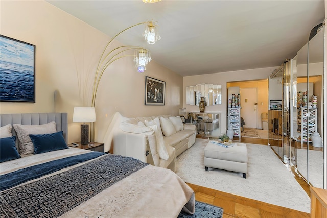 bedroom featuring an inviting chandelier