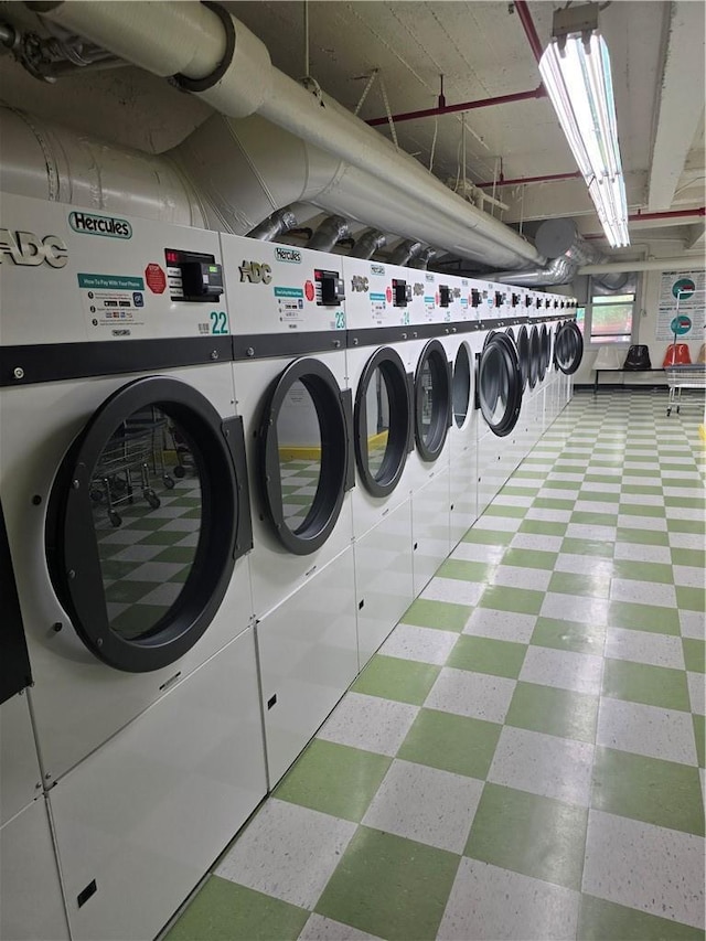 laundry room featuring separate washer and dryer