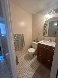 bathroom featuring vanity, tile patterned flooring, toilet, and mail boxes