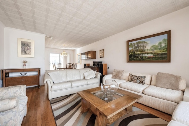 living room featuring dark hardwood / wood-style flooring