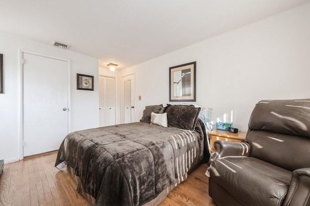 bedroom with light wood-type flooring