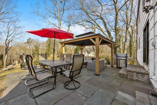 view of patio / terrace featuring a gazebo and grilling area