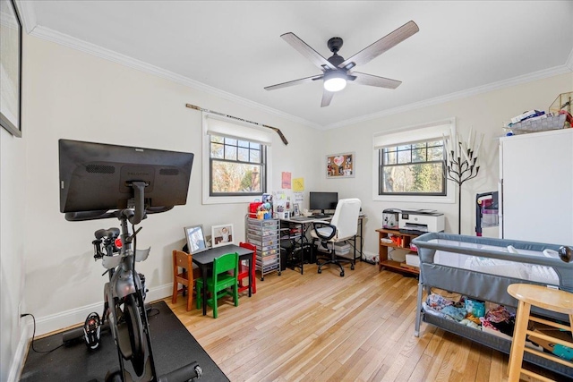 bedroom with crown molding, ceiling fan, and light hardwood / wood-style floors