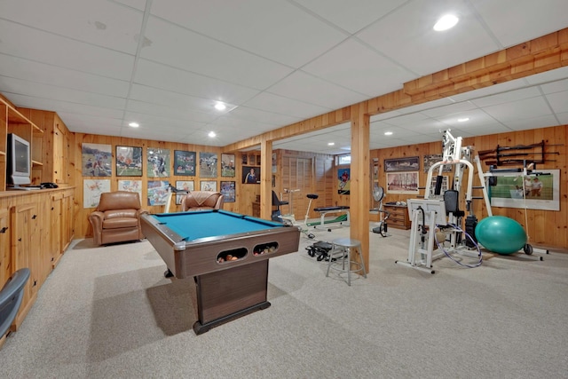 playroom featuring a paneled ceiling, light carpet, pool table, and wood walls