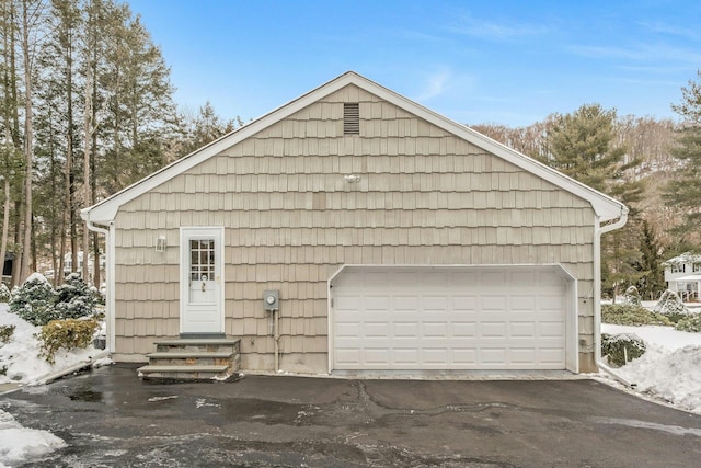 view of snow covered garage