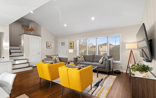 living room featuring lofted ceiling and dark hardwood / wood-style flooring