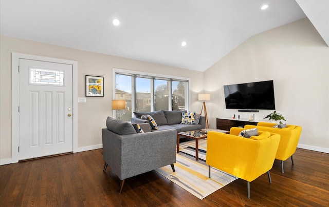 living room featuring vaulted ceiling and dark hardwood / wood-style floors