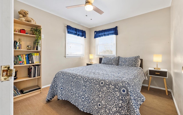 carpeted bedroom with ceiling fan